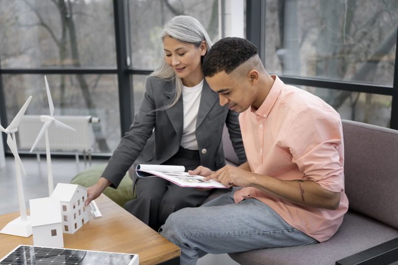 A focused foreign investor reviewing legal documents on a tablet to ensure they meet their FIRB property reporting obligations.